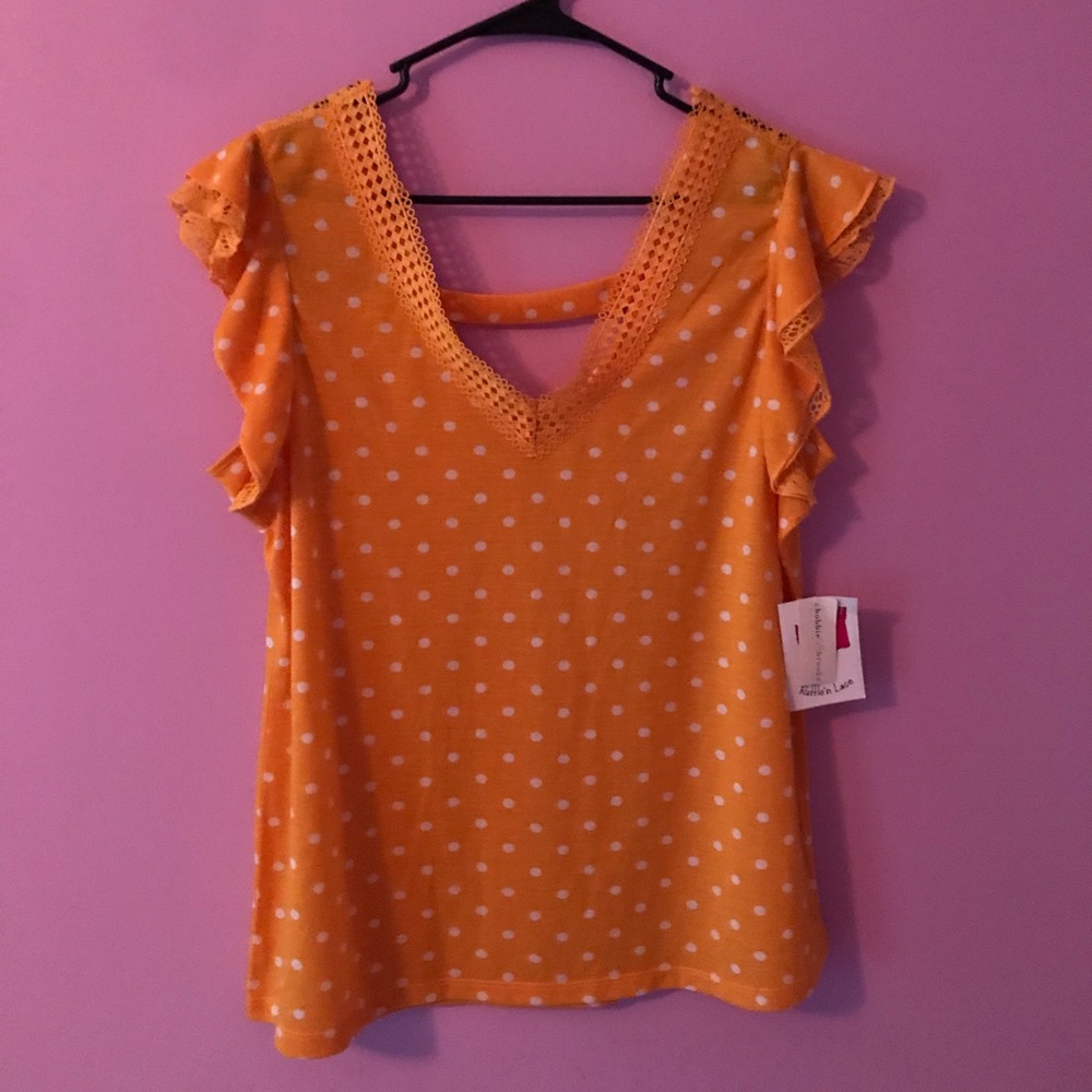Yellow with white polka dotted summer blouse